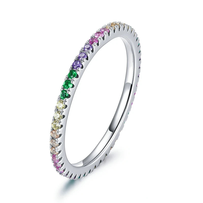 

Rainbow zircon eternity ring crafted in 925 sterling silver, featuring sparkling multi-colored zircon stones set around a slim polished band.

