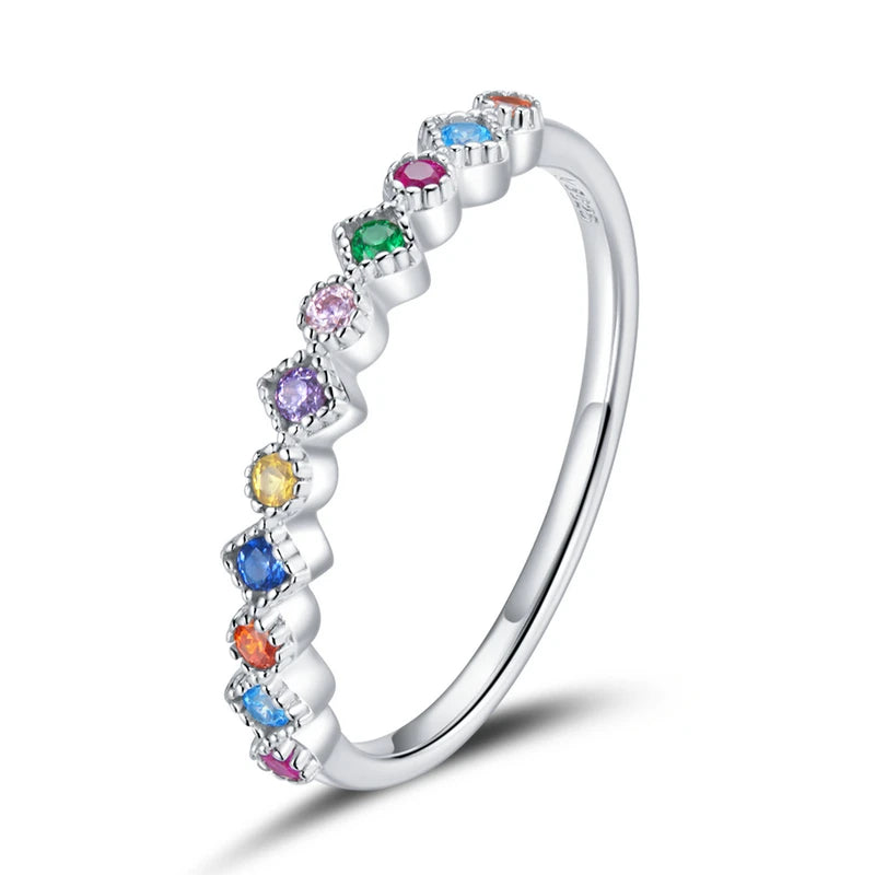 
Rainbow zircon eternity ring crafted in 925 sterling silver, featuring sparkling multi-colored zircon stones set around a slim polished band.

