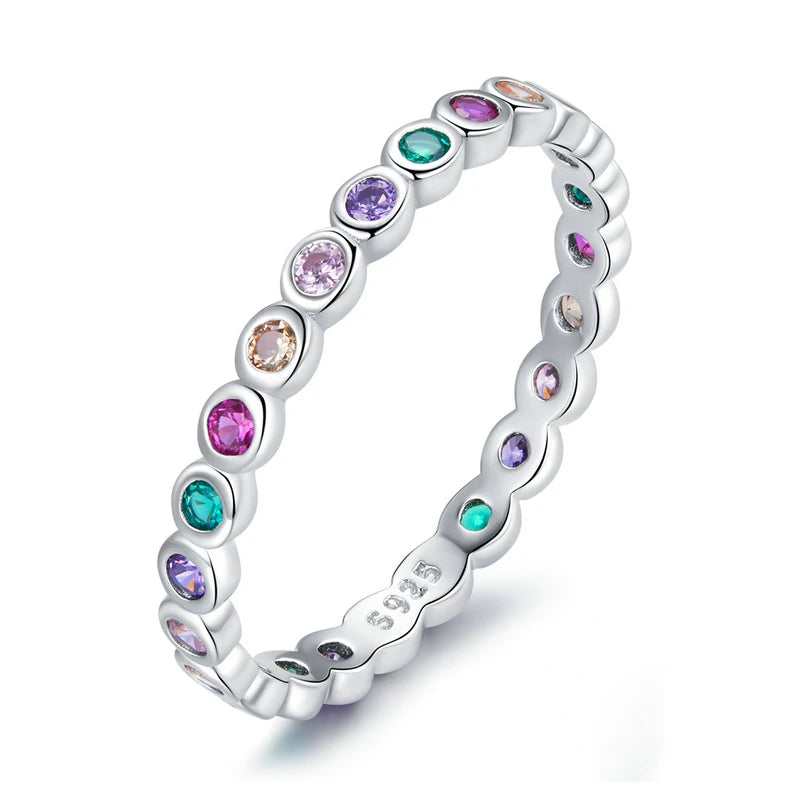 

Rainbow zircon eternity ring crafted in 925 sterling silver, featuring sparkling multi-colored zircon stones set around a slim polished band.

