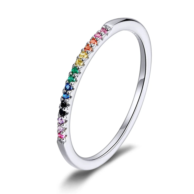 
Rainbow zircon eternity ring crafted in 925 sterling silver, featuring sparkling multi-colored zircon stones set around a slim polished band.

