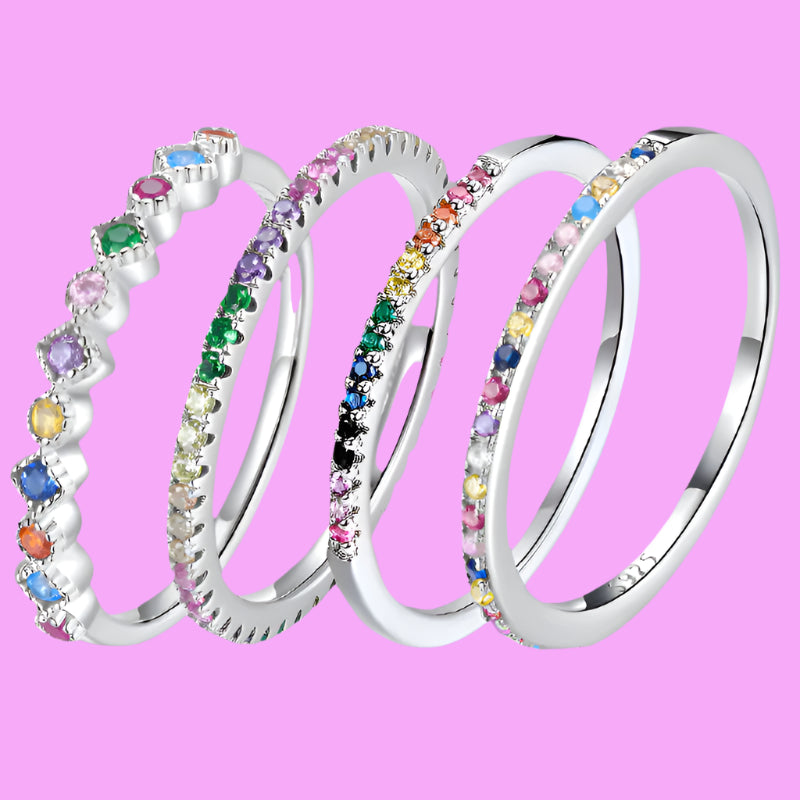 

Rainbow zircon eternity ring crafted in 925 sterling silver, featuring sparkling multi-colored zircon stones set around a slim polished band.

