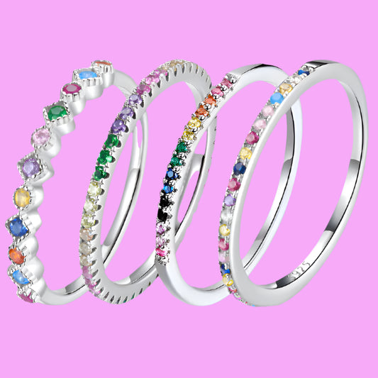 

Rainbow zircon eternity ring crafted in 925 sterling silver, featuring sparkling multi-colored zircon stones set around a slim polished band.

