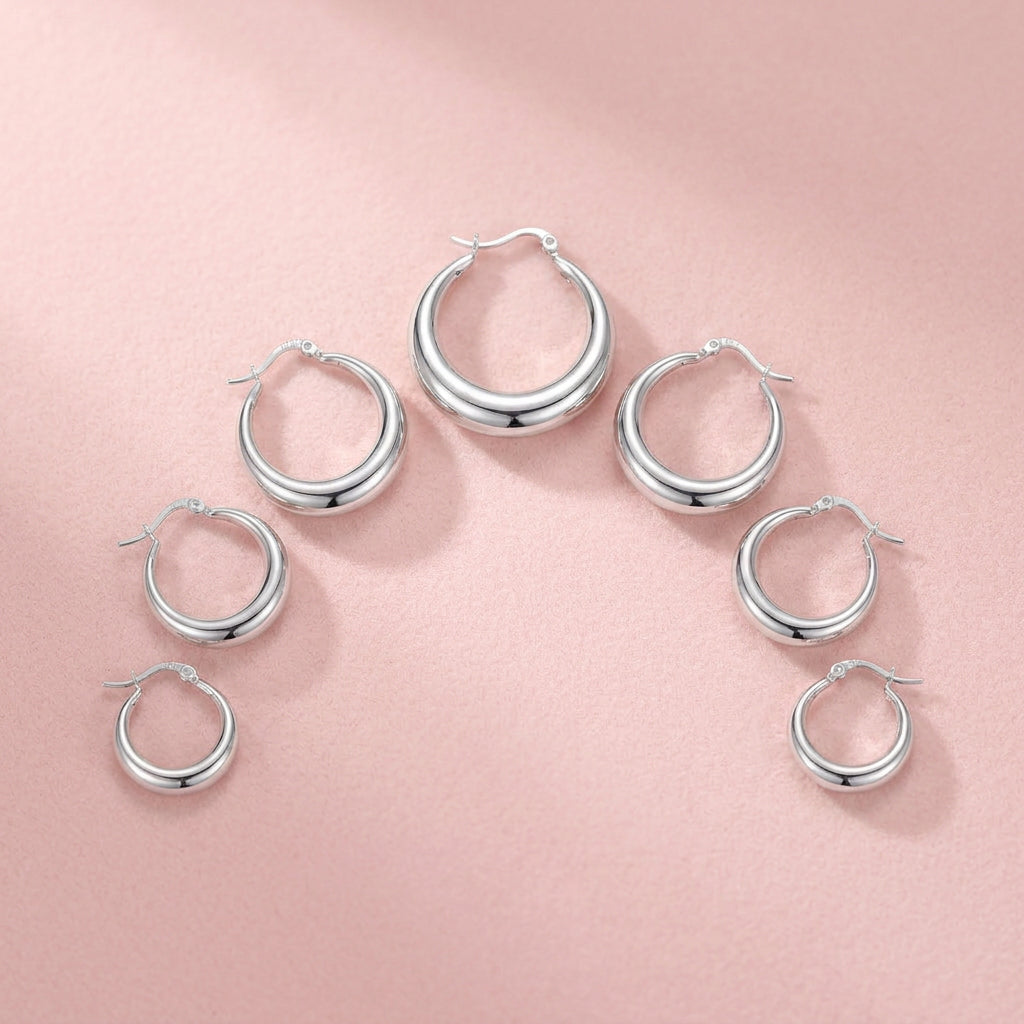 White gold plated chunky hoop earrings with 925 sterling silver posts, hypoallergenic women's jewelry with a polished elegant finish