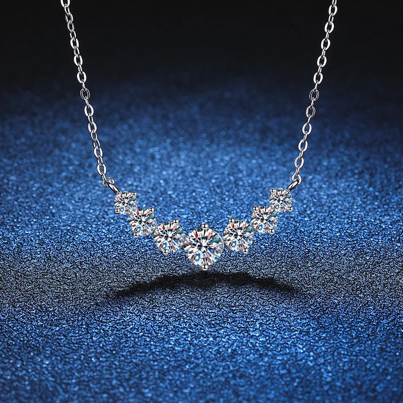 925 Sterling Silver Jewelry Necklace with Graduated Moissanite Stones and Curved Pendant Design
