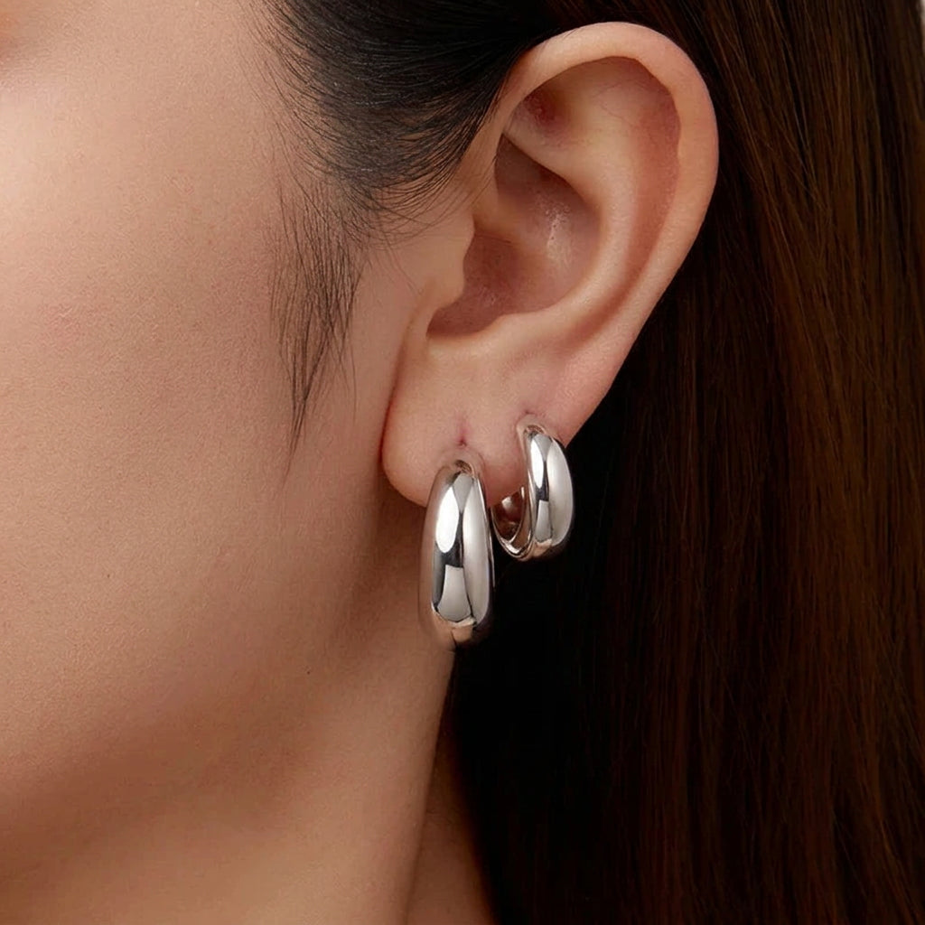 White gold plated chunky hoop earrings with 925 sterling silver posts, hypoallergenic women's jewelry with a polished elegant finish